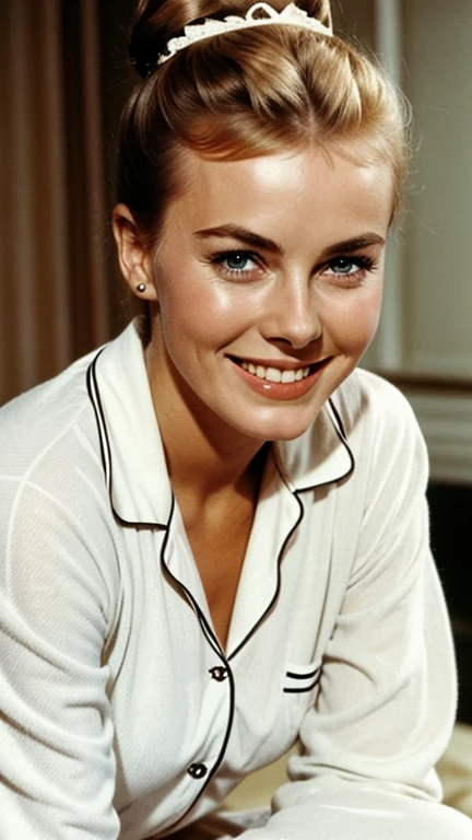 Jean Seberg wearing a bun with sexy pajamas and smiling