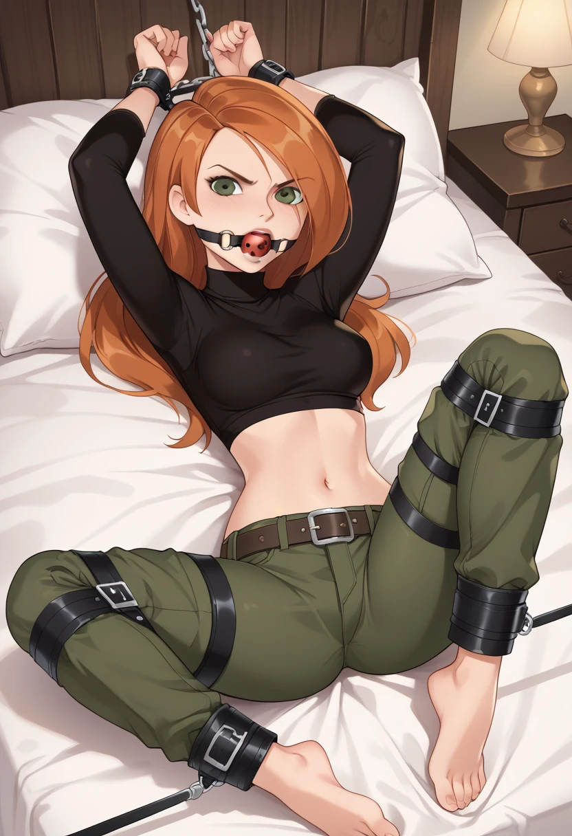 angry look, bound, bed straps, bdsm, bondage, restrained, gag, gagged, lying, bound legs, horizontally_restrained, spread_legs, 1girl, Kim Possible, red hair, navel,green eyes,midriff, belt, green cargo pants,orange hair,black crop top,turtleneck long sleeves, solo, stationary restraints, arms up, legs tied up, angkle metal cuffs, restrained, ball_gag, BREAK score_9, score_8, (score_7:0.5), (score_6:0.5)