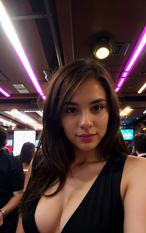 brown hair woman taking a selfie in a nightclub