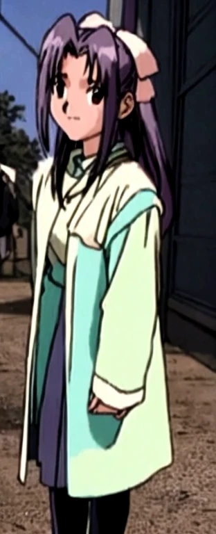 Momoko Koigakubo is standing wearing a coat。