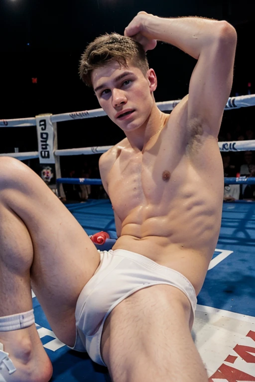 White boy, 18 years old, naked body, lying on the ground, in a boxing ring