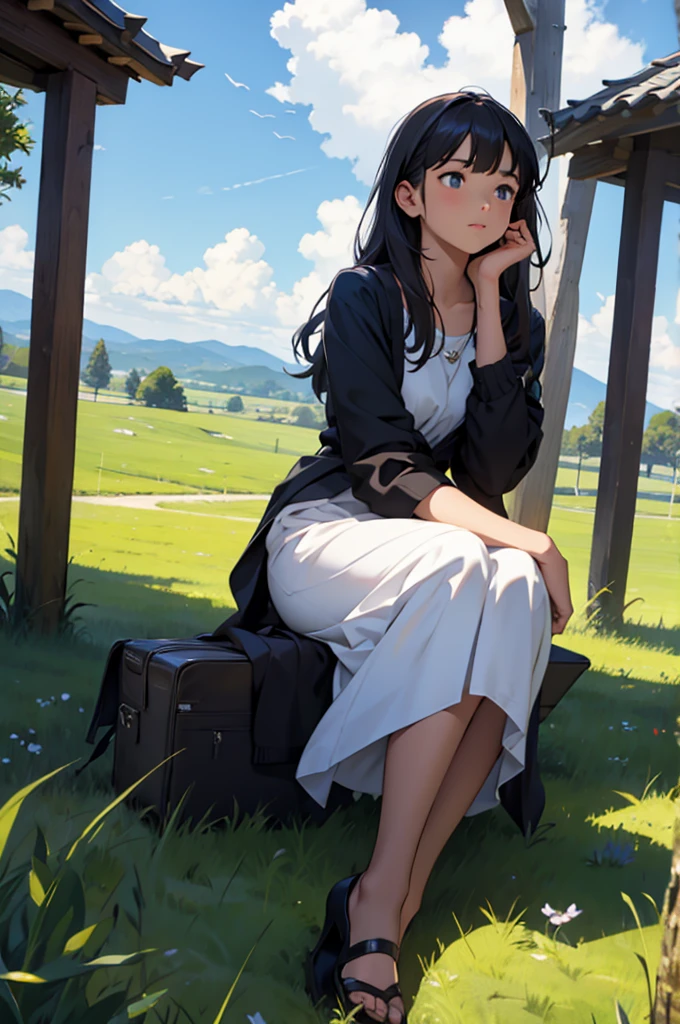 Girl, gazing the sky, sitting on the grass
