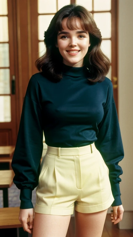 Isabelle Adjani wearing tight long sleeve shirt and shorts and smiling