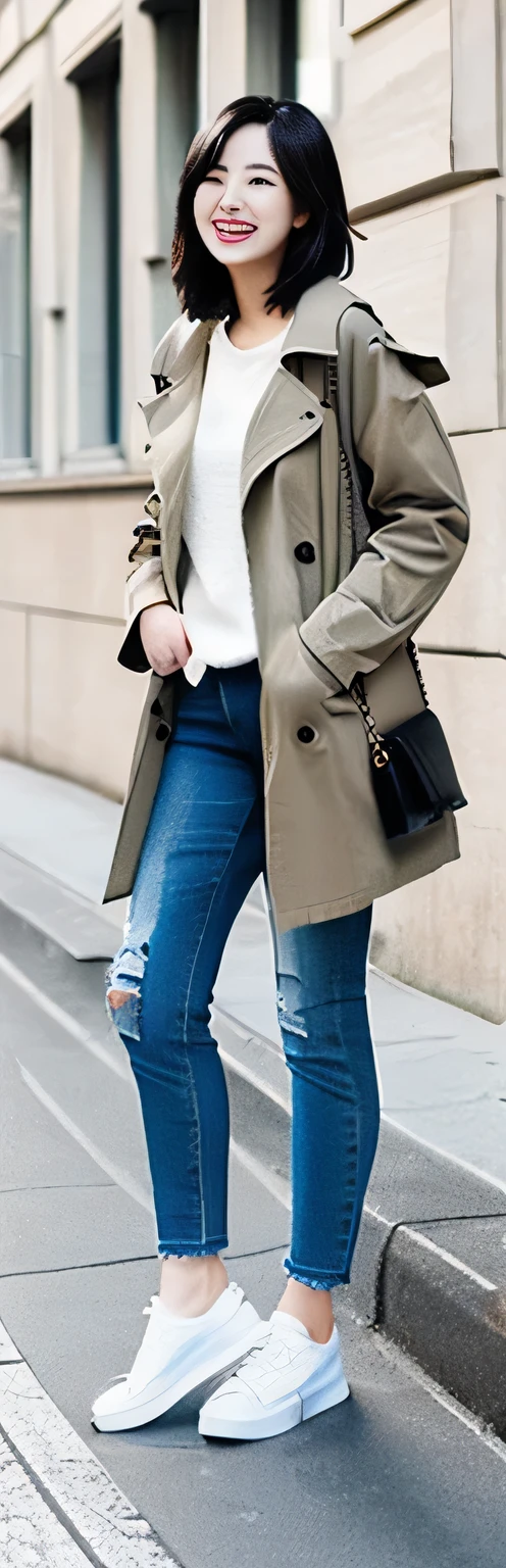 Standing woman、Full body photo、Black Hair、Short Haircut、smile、trench coat、Skinny jeans、sneakers、The background is the building's corridor.