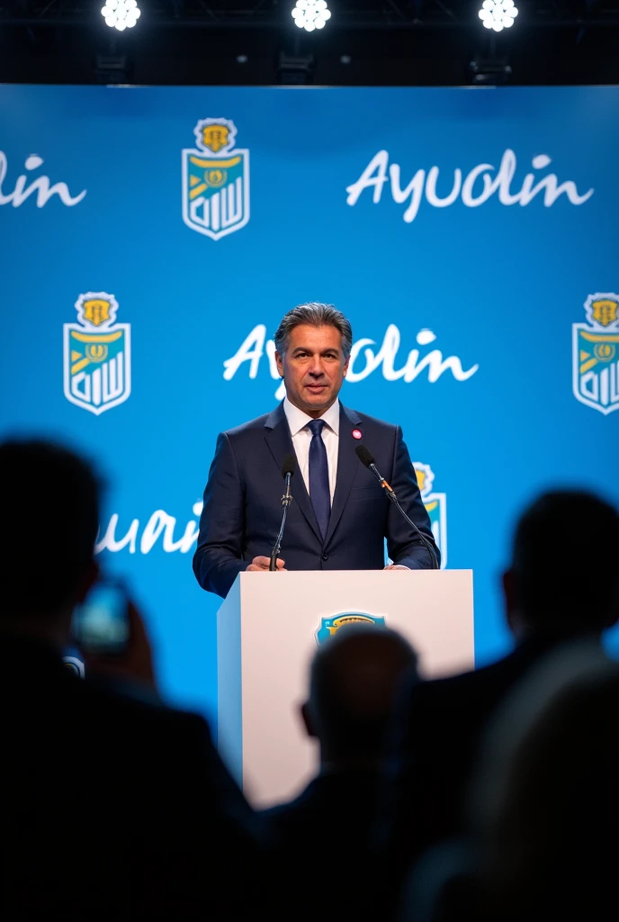 I need a photo of Marcelo Gallardo at a press conference with Ayudin as sponsor 