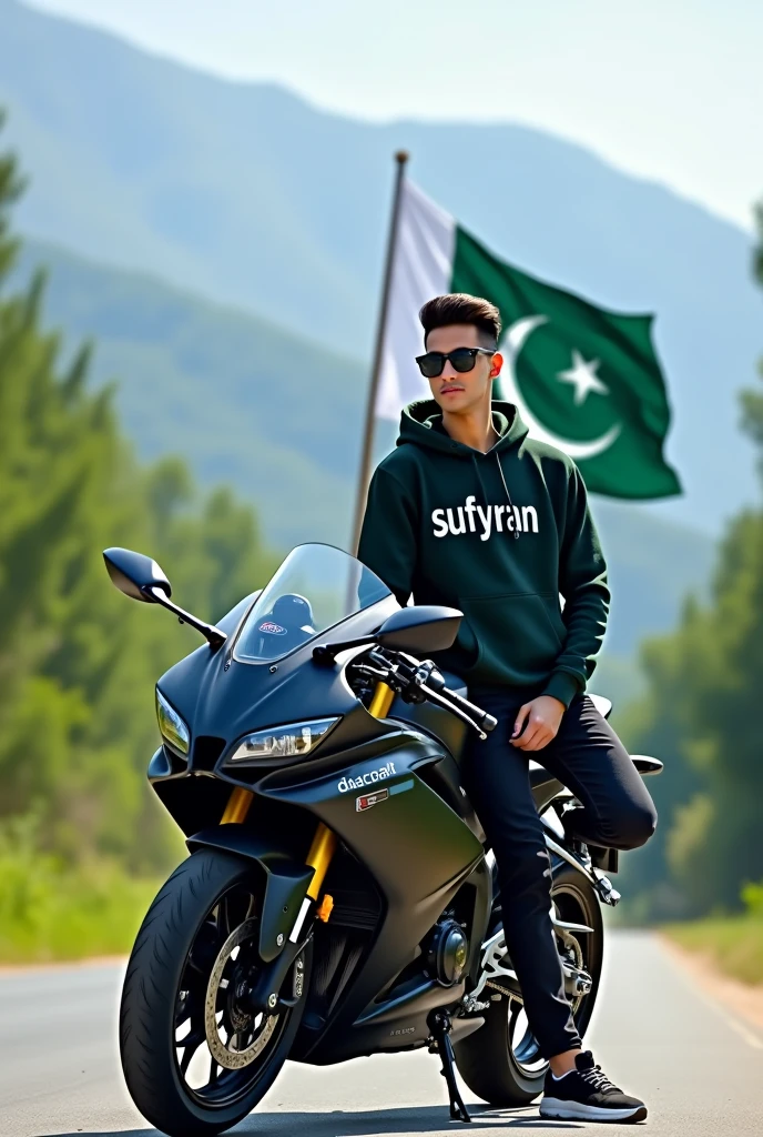 A stylish 18 year old with a fair complexion and short, neatly styled long hair is leaning against a green and white sportbike on a scenic road with green trees and mountains in the background. He is wearing black sunglasses, a dark green hoodie with the name 'sufyan' written on it in white letters, black jeans, and black and white sneakers. Behind him, the national flag of Pakistan is waving in the wind. The setting has a bright and clear day, and the overall vibe is modern and cool."