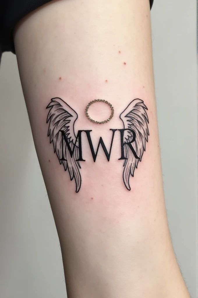 Monogram with letters MWR and the letter m must have angel wings or a halo. The small tattoo