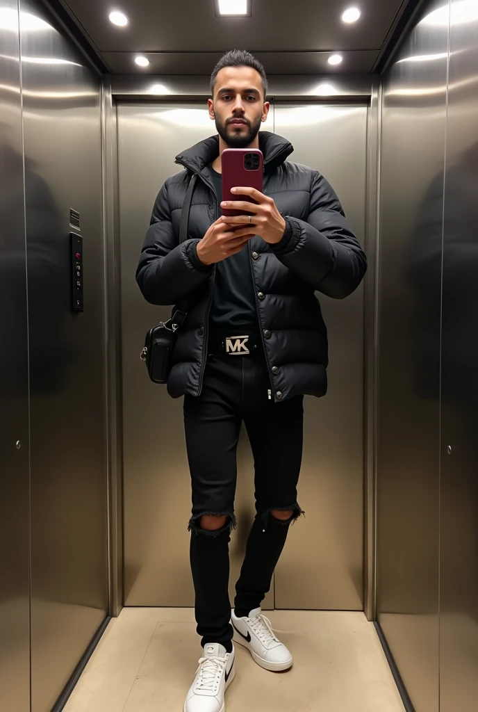 Man hindu with not long straight hairstyle “curtains”, dressed in white nike sneakers, black ripped jeans, BLACK buttoned puffer jacket, Belt with MK buckle and small black shoulder bag, he must to take a picture of himself in the mirror of lift on his iphone 12 in burgundy case