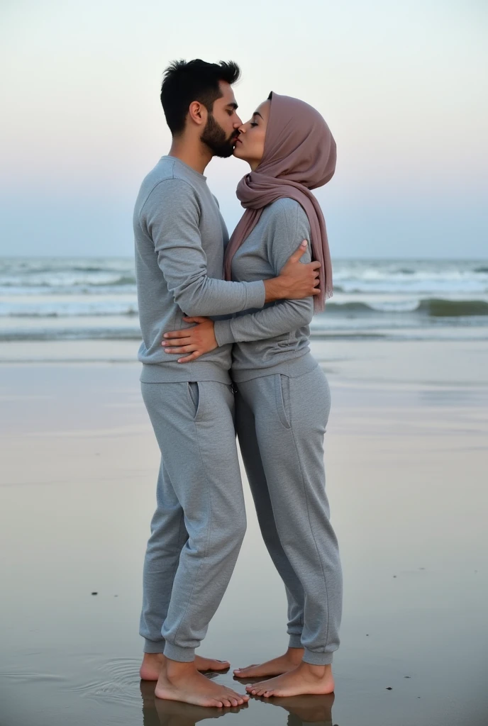 hijab, grey sweatpants, Barefoot woman kissing her boyfriend on the beach