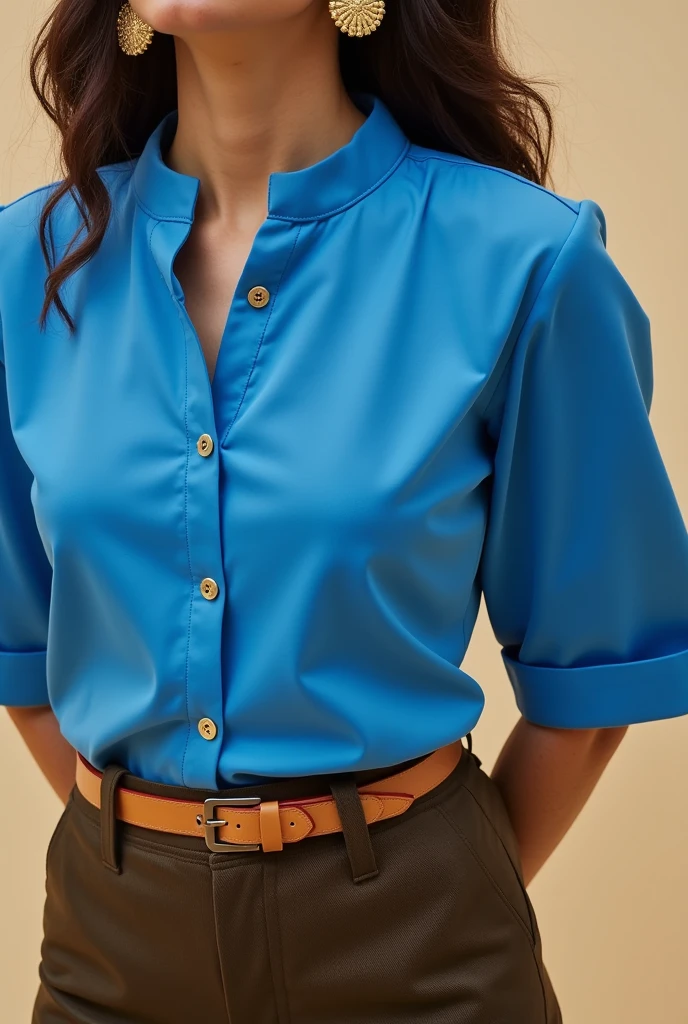 A close-up of a woman in a skirt dressed in a blue blouse and gold earrings