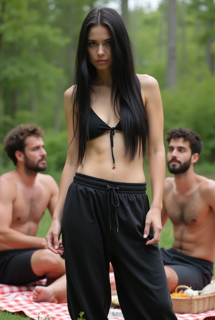 black hair, White skinned, black sweatpants, barefoot, braless woman having picnic with male friends. 