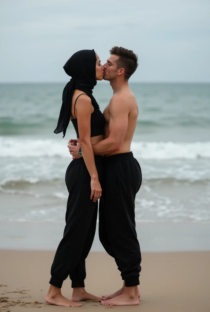 with black headscarf, barefoot, black sweatpants, braless woman, kissing with boyfriend on the beach