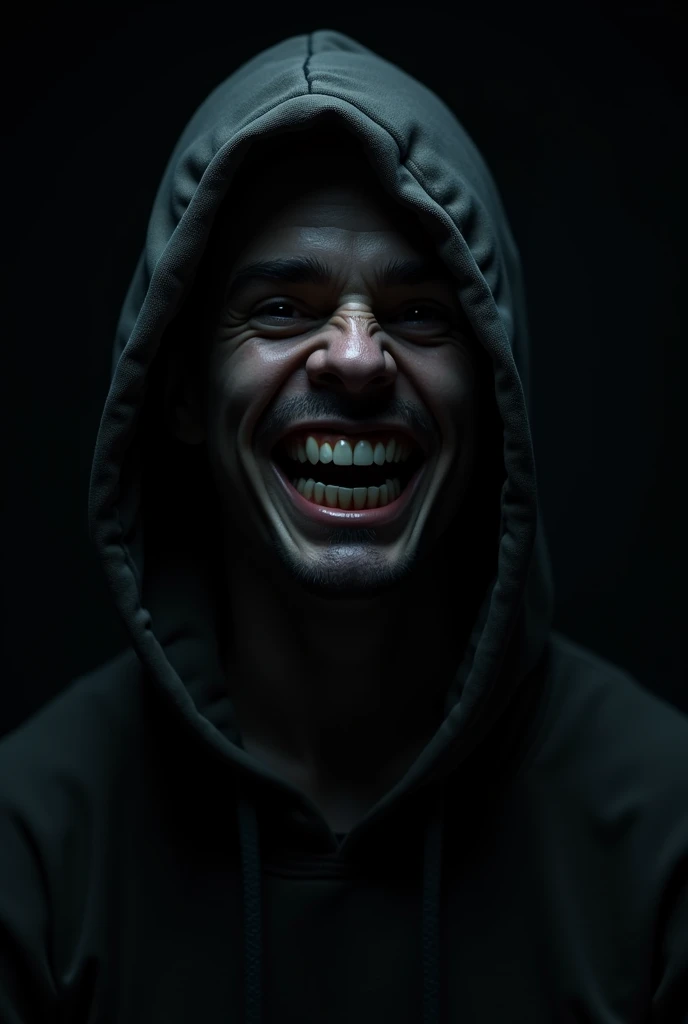 Anonymous person wearing hoody smiling creepily with black background