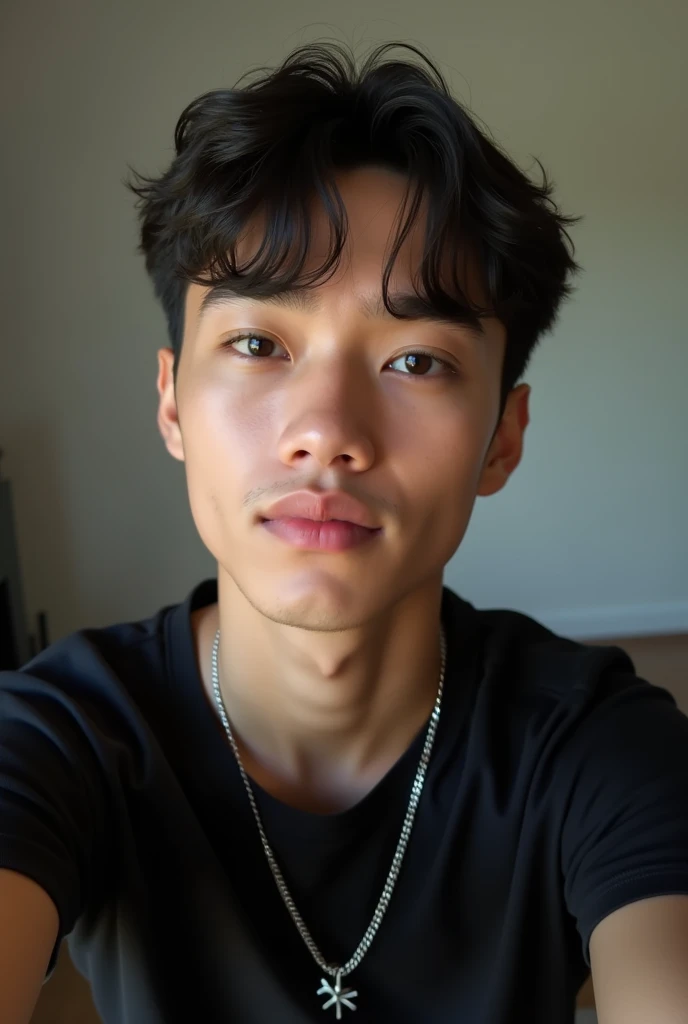 handsome 17 year old boy with short hair wearing black shirt and necklace taking a selfie