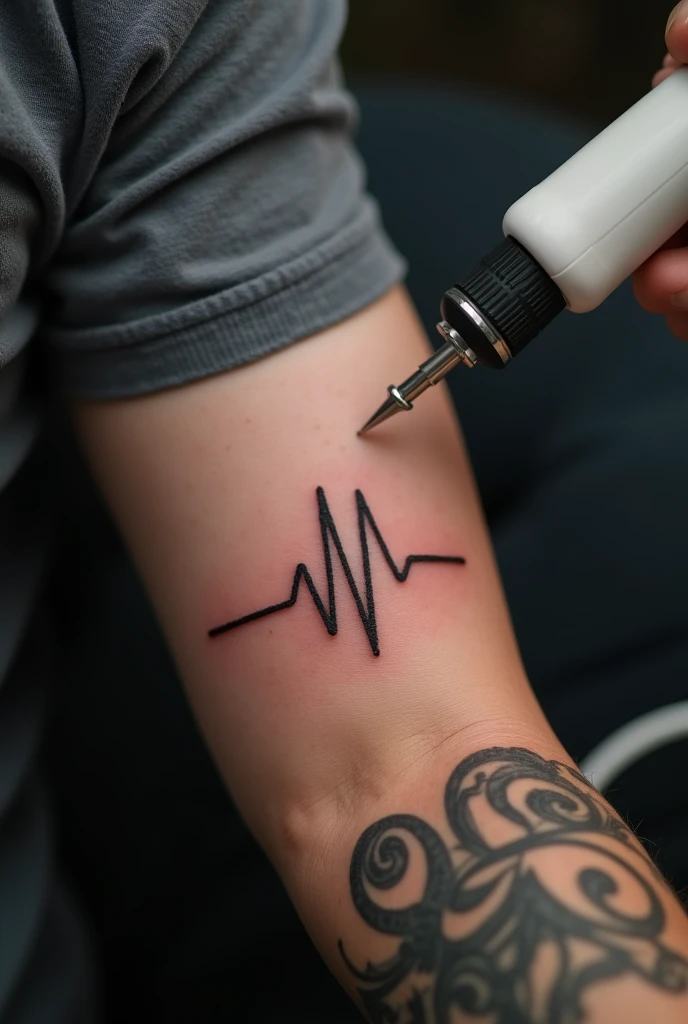 Image of a cardiogram logo on the hand with a tattoo machine on the arm