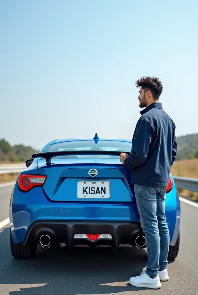 A 24 years boy park him  nisan blue colour car in highways and he ready to take a photo with car. And tha car number plate have a name the name is "KISAN"