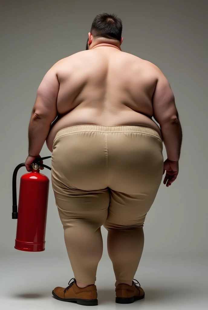 A chubby young man carrying a fire extinguisher, his buttocks padded with very thick stiff paper.
