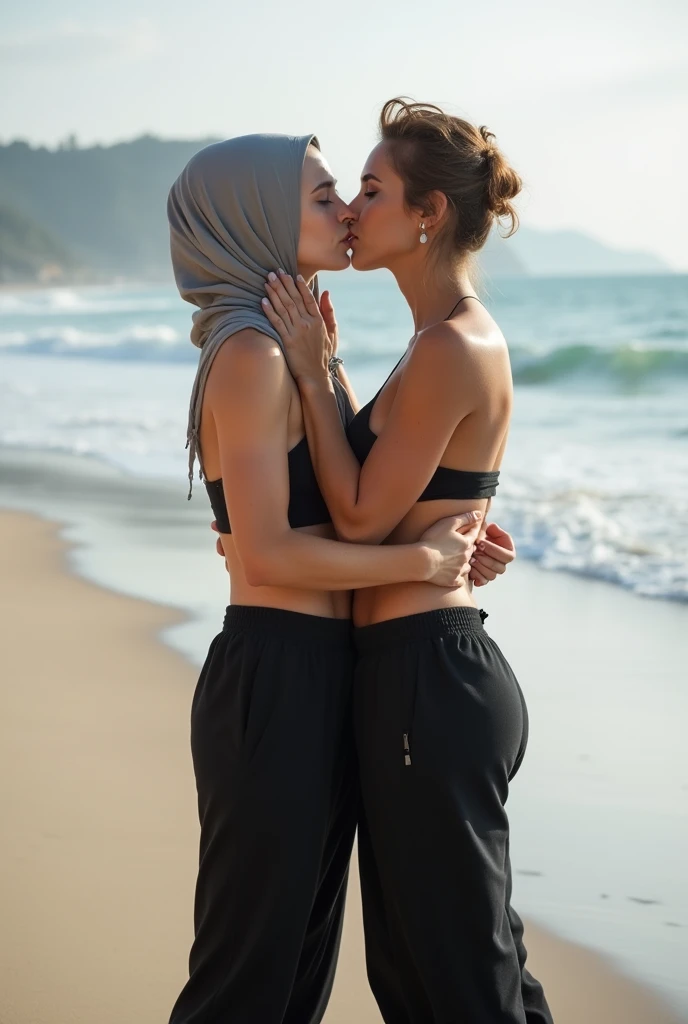 With headscarf, black sweatpants,  barefoot,braless woman kissing her boyfriend on the beach