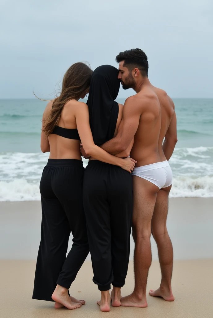 with black headscarf, barefoot, 2 women in black sweatpants, Two men wit? no pants and no underwear hugging each other on the beach