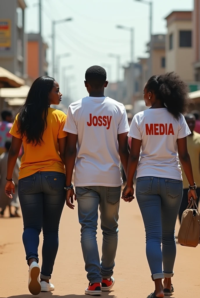 A photo of three African walking two ladies and a youthful man at the center of girls, first girl wearing a t-shirt written Jossy middle man wearing t-shirt written Online and the other girl written Media at the back