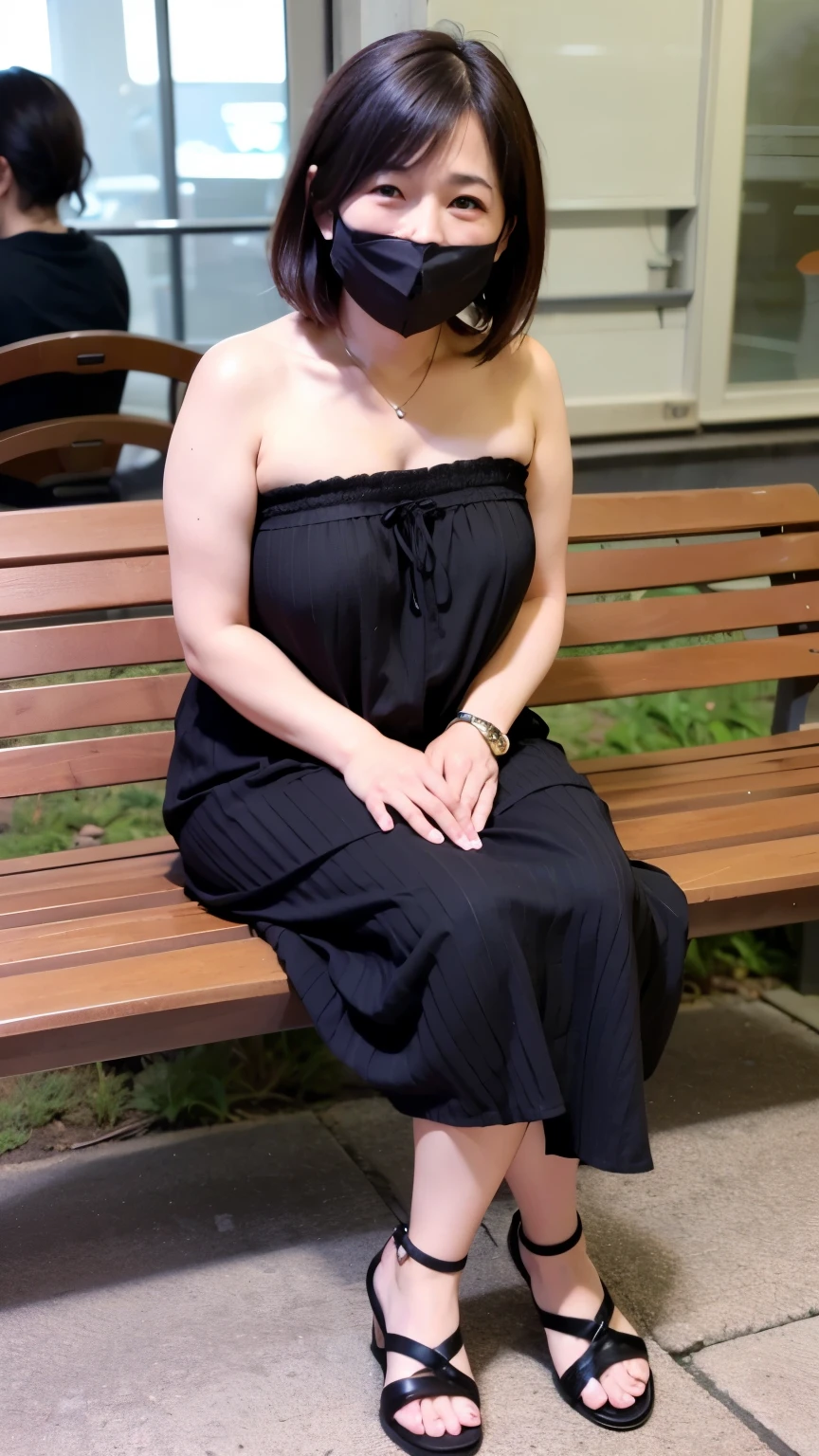 A 30-year-old Japanese woman is sitting on a bench outdoors at night Light Asian Skin Tone Black, shiny medium length hair with slightly rough ends Blushing cheeks and smiling Wearing a high-necked tube top dress Wearing black sandals With legs spread Wearing a black mask