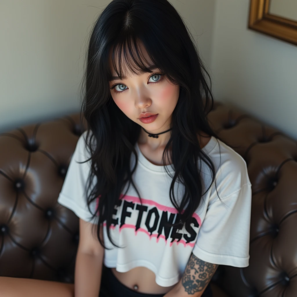 19 year old Asian girl, with outstanding beauty, bright blue eyes, and a perfect face like each of her features, face inspired by singer Billie Eilish, long shiny black hair, pale skin and thick, shiny lips, sitting on the couch, wearing a short white shirt that saids "DEFTONES", perfect body, with tattoos, big tits