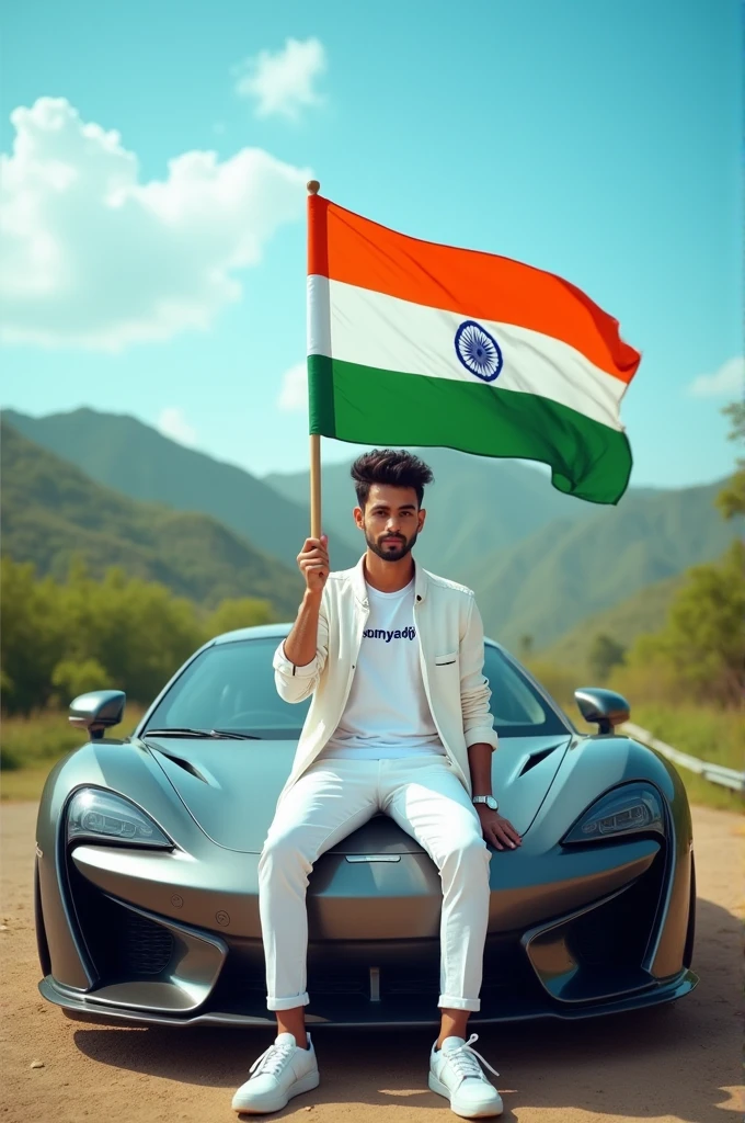 Create an Real image featuring a young man sitting on the hood of sports car, with Indian's scenic background. He's holding a flag celebrating Indian 15th August. The boy wears a soumyadip T-shirt with 'soumyadip' printed on it, white jacket, white pants, white shoes