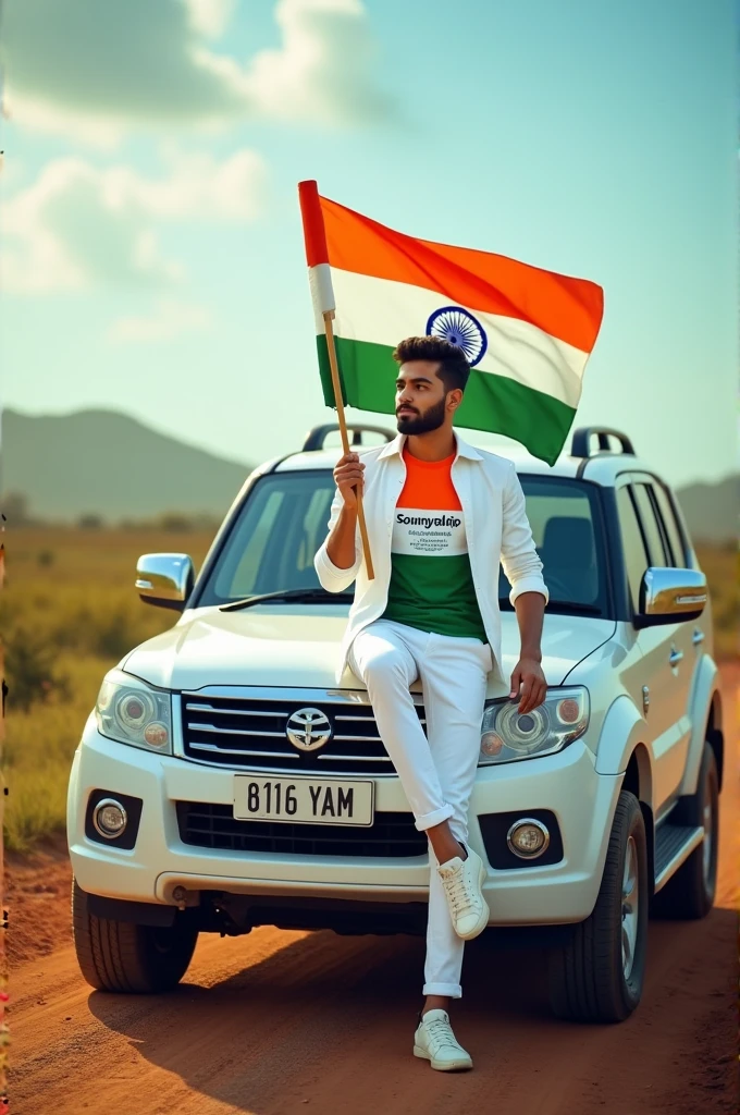 Create an Real image featuring a young man sitting on the hood of scorpio car, with Indian's scenic background. He's holding a flag celebrating Indian 15th August. The boy wears a tirnga T-shirt with 'soumyadip' printed on it, white jacket, white pants, white shoes 