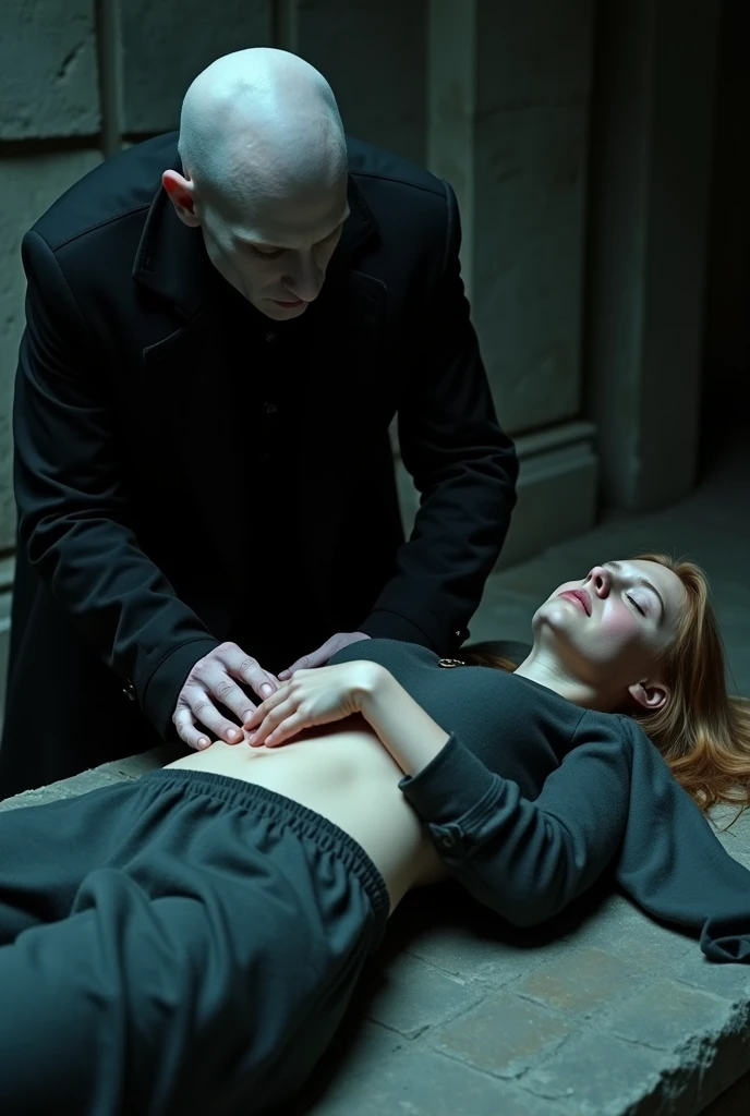 Voldemort has Hermione lying flat on a cold, stone table, her shirt lifted up to reveal her bare abdomen. Voldemort, with his pale, skeletal features, leans over her with a focused expression. His right hand is firmly massaging
Hermione's exposed abdomen, moving slowly and deliberately across her belly as he applies pressure with his fingers.
Hermione's face shows a mix of discomfort and vulnerability, her eyes partially closed as she endures the invasive touch. The dim light in the room casts deep shadows on the stone walls, emphasizing the tension in the scene and the intensity of Voldemort's actions.