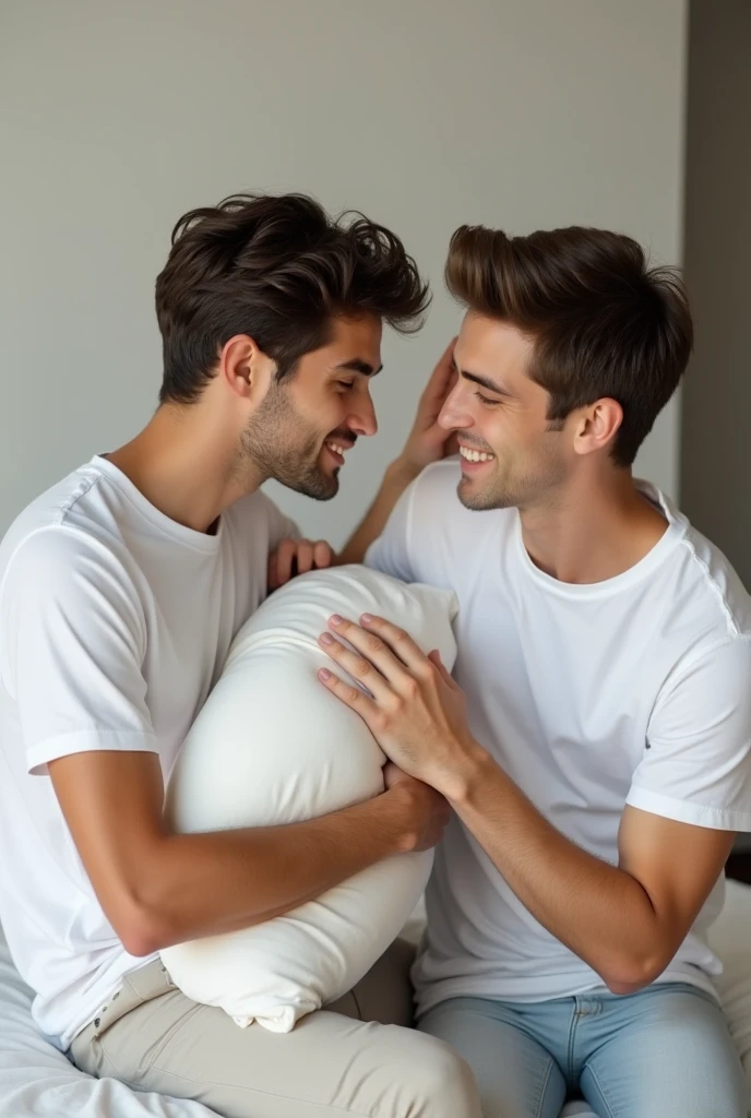 A young man, Beautiful, handsome, skinny, white t-shirt white playing with the pillow hitting with his brother hitting with the pillow