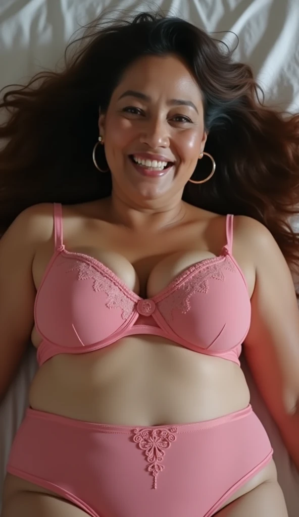 60-year-old woman in yellow lingerie curly hair in the room of her house.