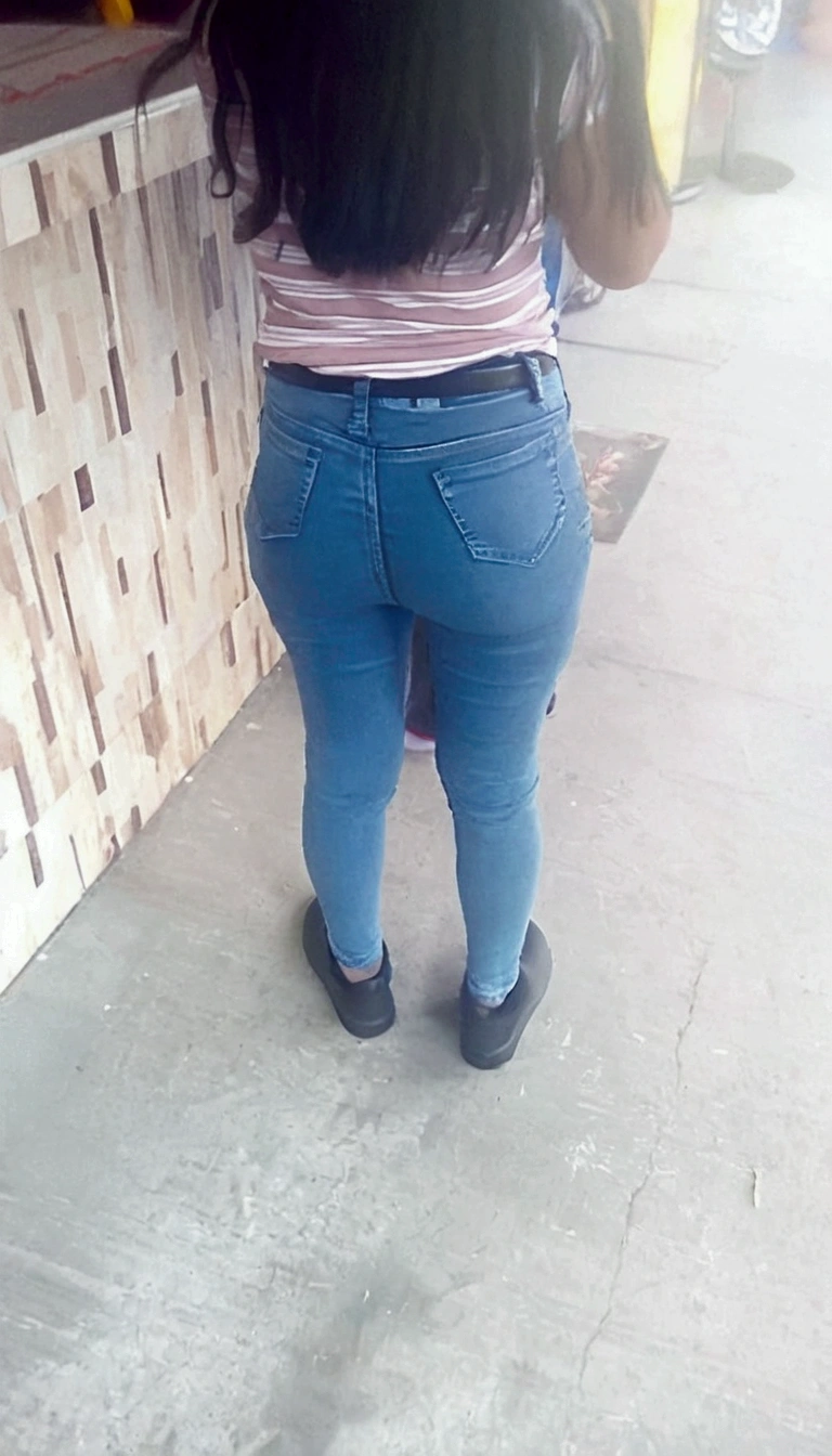 A curvy woman in tight pants, extremely hot and sexy, huge butt, extremely sexist, visible pantyline, beautiful detailed face, detailed eyes, beautiful detailed lips, long eyelashes, realistic, photorealistic, photo-realistic:1.37, best quality, 8k, highres, masterpiece:1.2, ultra-detailed, vivid colors, studio lighting, physically-based rendering