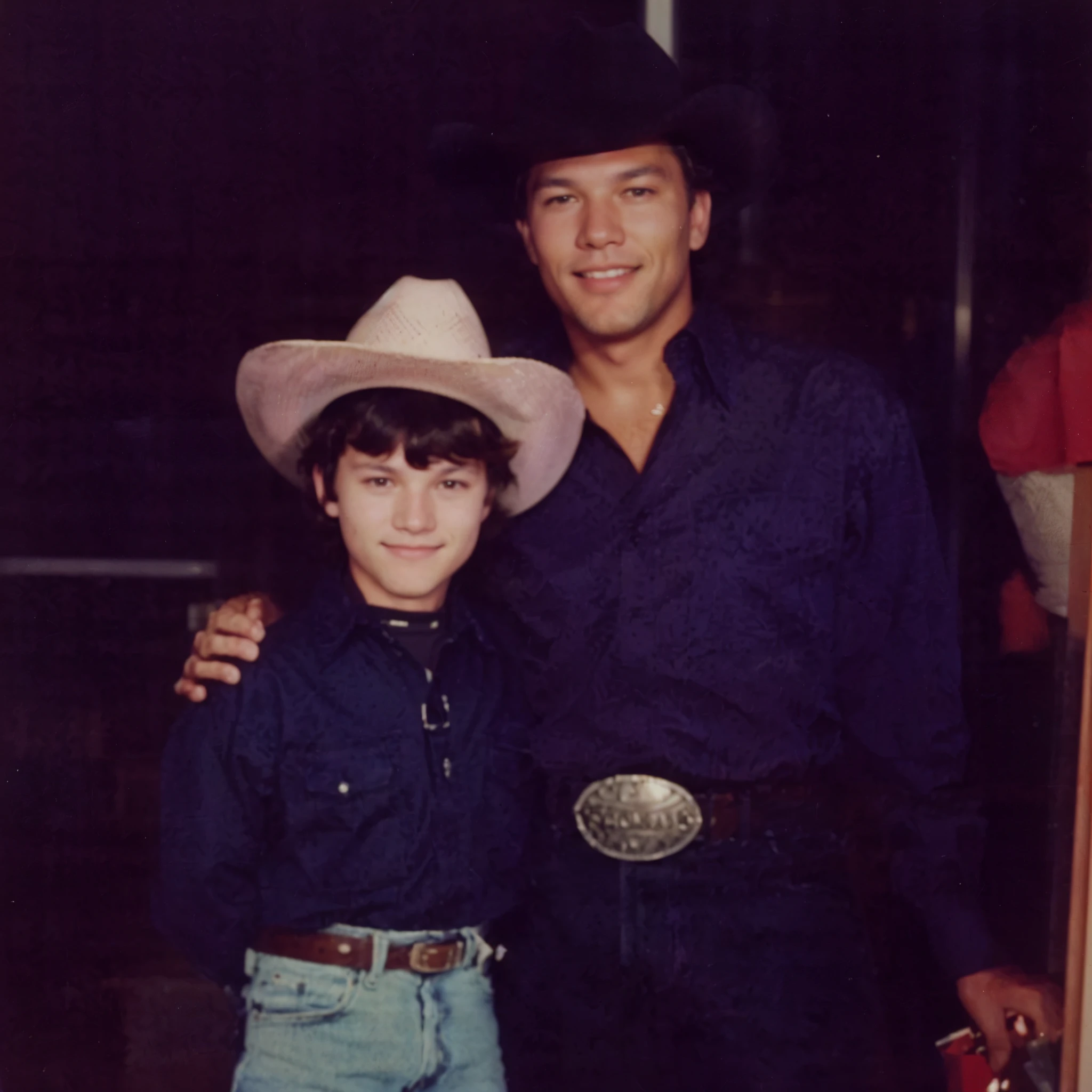 there is a man and a that are posing for a picture, george strait, cow-girl, jr ewing from dallas, grainy photo, by Bernie D’Andrea, with a kid, marc newsom, unknown location, grainy vintage, 1 9 8 0 s photo, 1980s photo, photo from the 80s