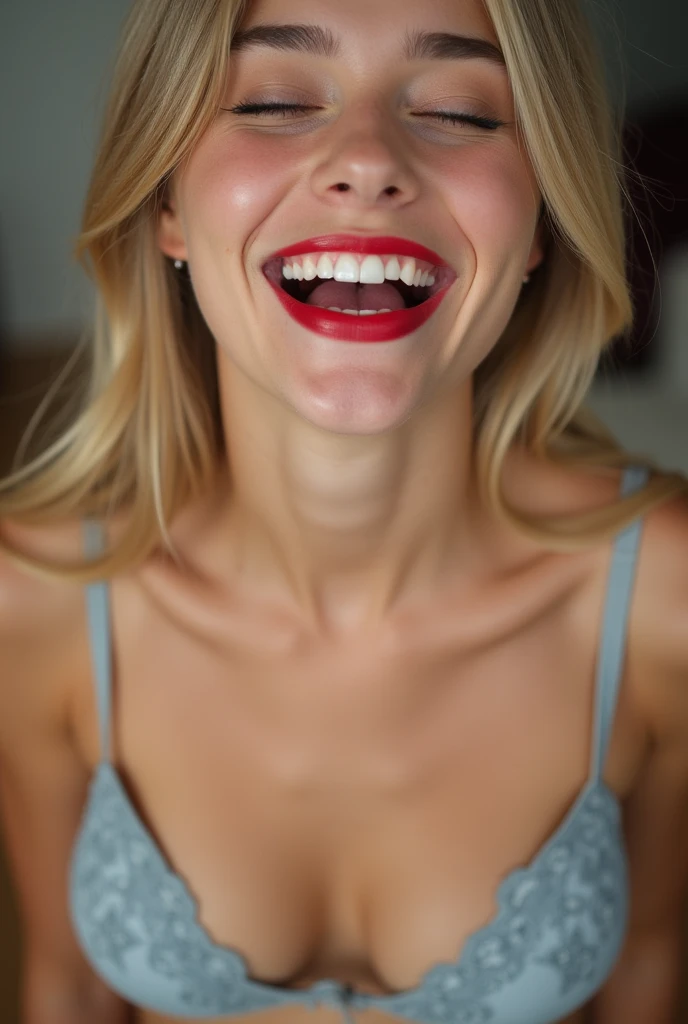 closeup of a female teen’s face wearing red lipstick, mouth wide open and smiling, naturally blonde hair, wearing strapless bra, viewed from above