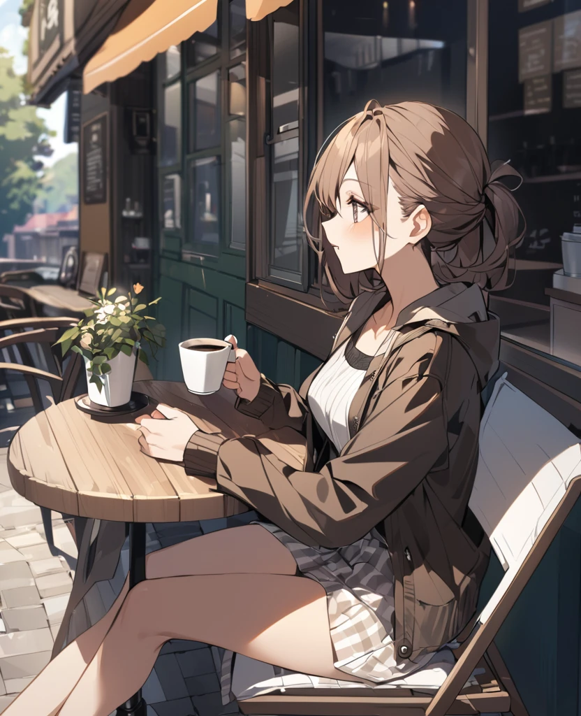 A woman sitting on a chair drinking coffee at a roadside cafe terrace
