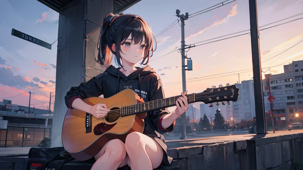 A girl playing guitar at dusk.