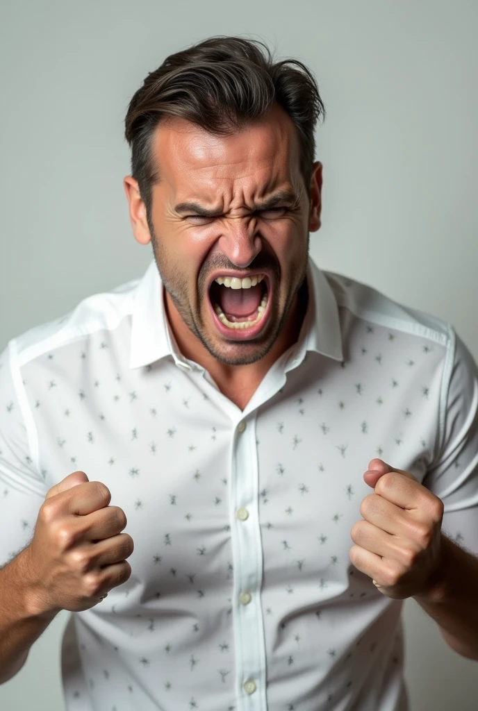 A man wearing a white shirt with a pattern is angry.