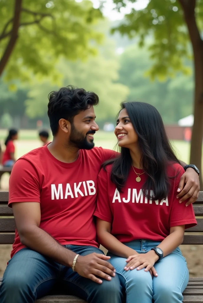 A young Indian couple sitting on a park bench together in a beautiful park. The man, wearing a red t-shirt with his name "Makib" in bold letters, smiles warmly at the woman. The woman, wearing a cute outfit with a watch and necklace, has her name "Ajmina" written in bold letters on her t-shirt. They both smile at each other. Children are playing happily in the background. The image is high quality (4k). pen spark tune share moreover