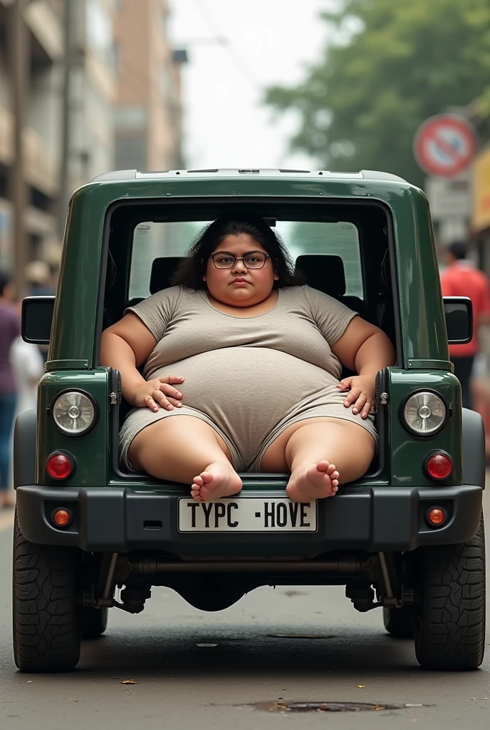 an extremely overweight girl who cant fit in the mahindra thar