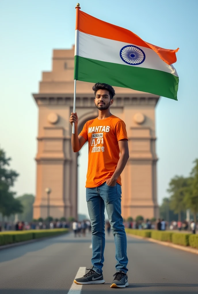 A real 23 years old boy, Wearing Orange T shirt blue jeans sneakers and the name MAHTAB KHAN" is written on his t-shirt and the boy is standing on the road with holding a national flag of India, and behind him is the India gate Delhi. And "Happy Independence Day 2024" written at above sky Create Realistic image high quality.