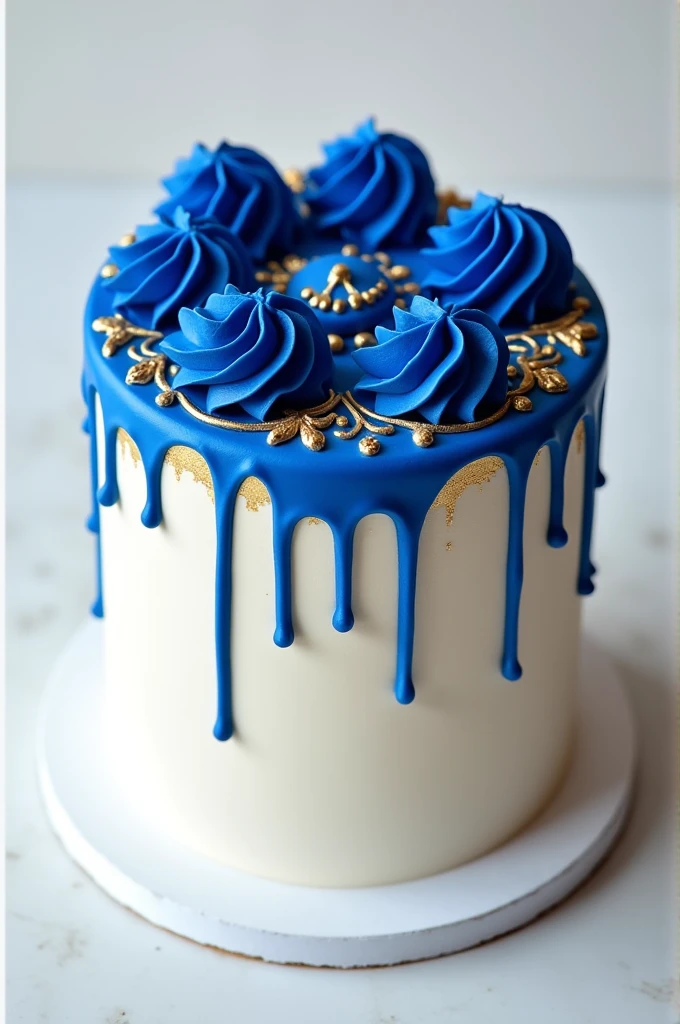 White base cake with royal blue cream and gold details