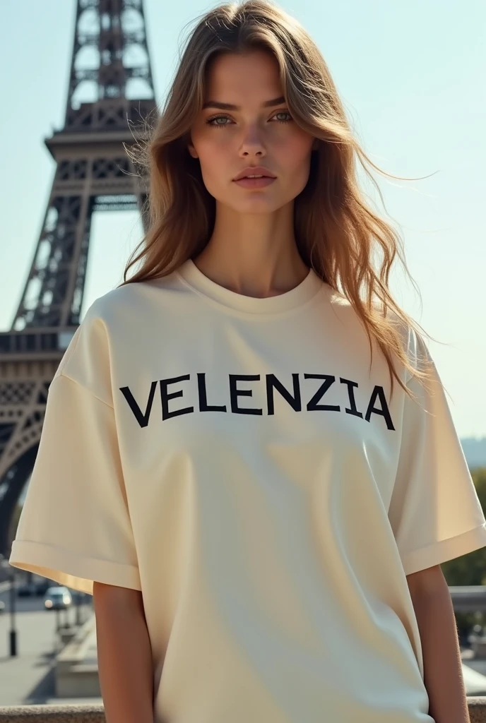 Create a photo of an  model wearing a creame colour oversized tshirt and on the tshirt it's written VELENZIA with black colour on the chest and she is standing in front of iphel tower