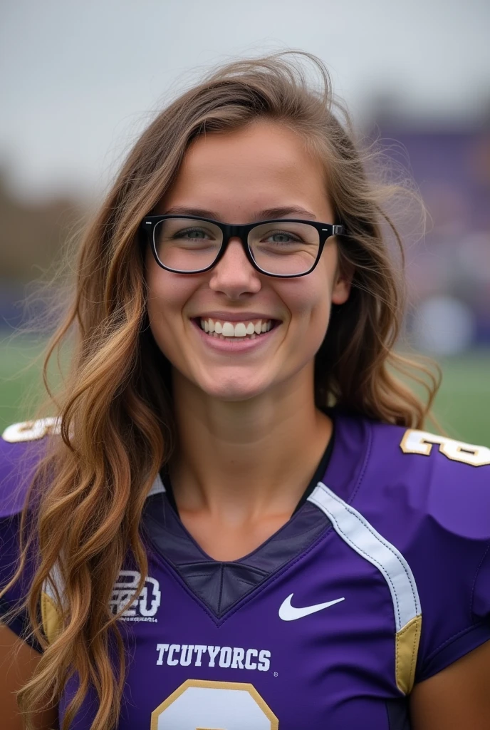 A photo of Emily Goldsmith, a quarterback for the female TCU Horned Frogs football team. Number 8. Brown wavy hair and glasses