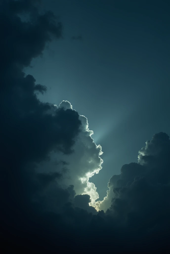 a dark sky with dark clouds and in the middle a light coming down to the ground