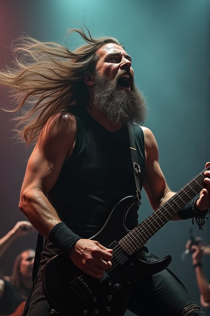 A men with a long hair and beard singing while headbanging with a band in a death metal type band