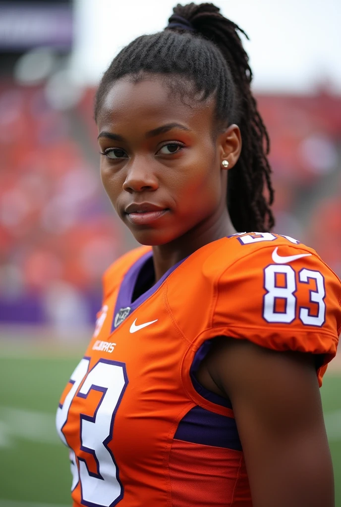 A photo of Erin Green, a wide receiver for the female Clemson Tigers football team. Number 83. Below average height for a wide receiver, but I make up for it with great speed and hands