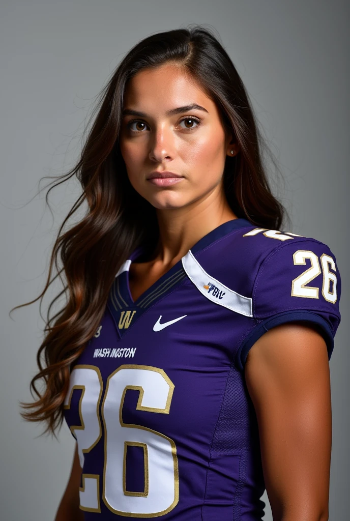 A photo of Ashley Collins, a quarterback for the female Washington Huskies football team. Number 26. Brunette