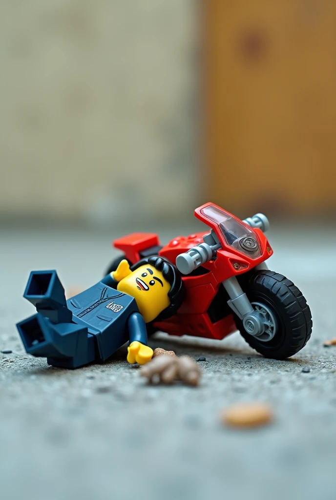 Lego doll and motorcycle both fell on the ground