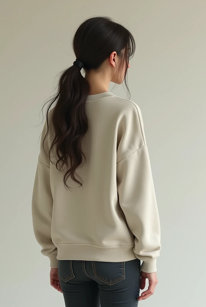 Girl from behind with a sweatshirt
