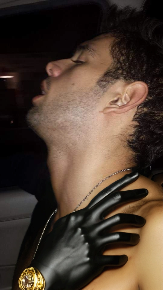 Add a hand touching his bare chest.